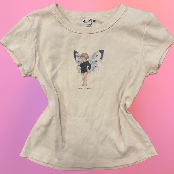 Brandy Melville Off White Creme “I don’t care” fairy graphic baby tee, small - Picture 2 of 7